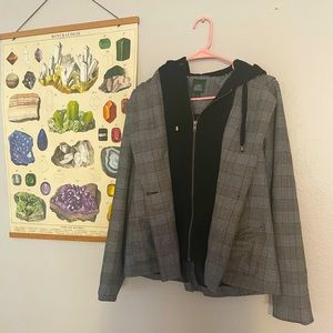 Plaid blazer with layered look.
